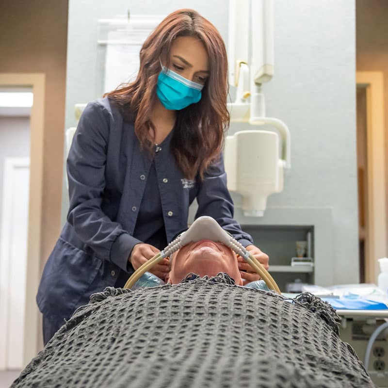 doctor readying patient for surgery